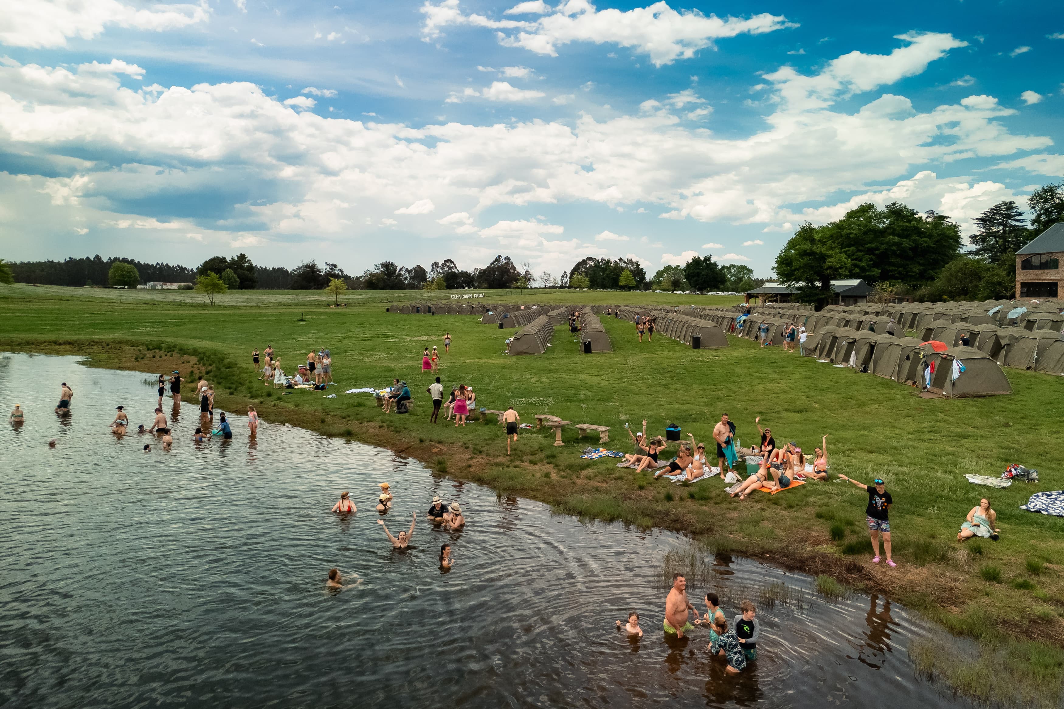 Aerial view of race village, dam and swimming area